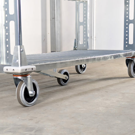 Metal platform truck with wheels on a concrete floor