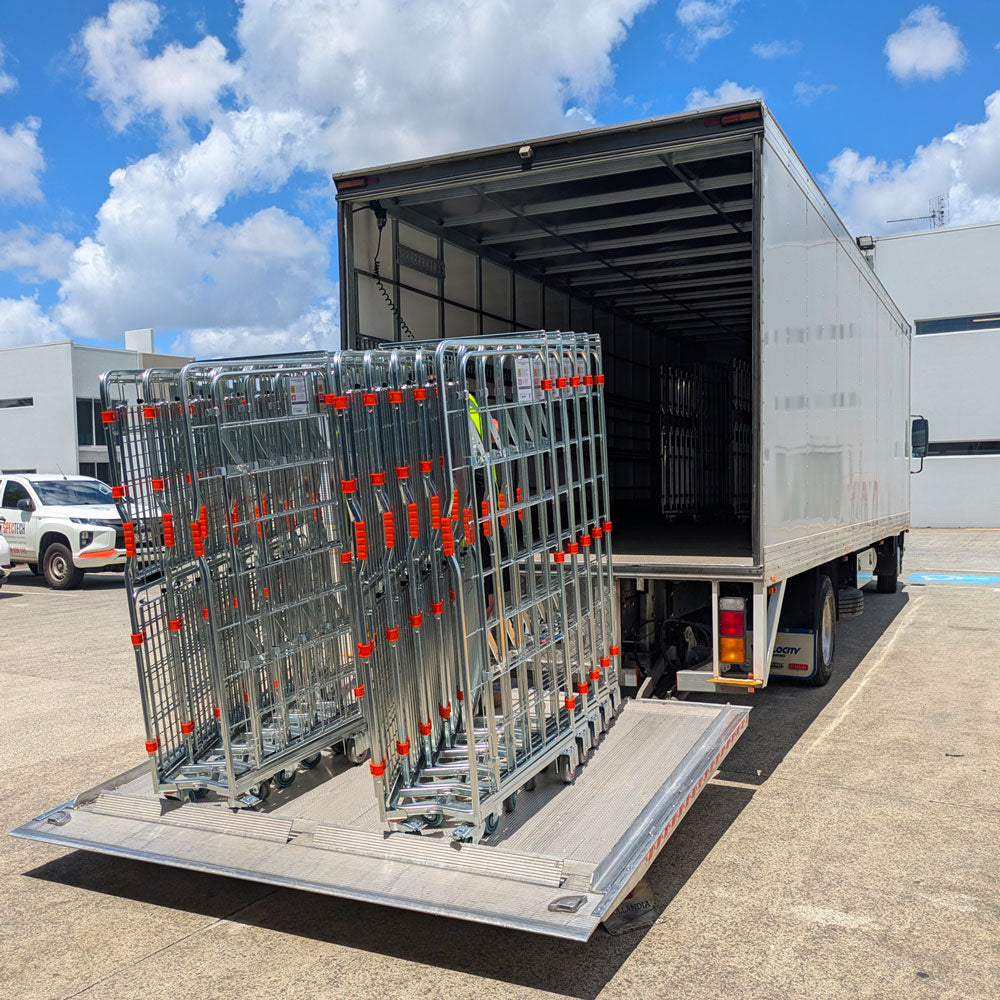 roll cages being loaded onto truck