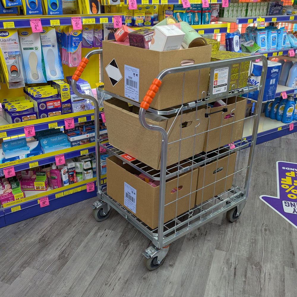 RCS06 trolley with 2 shelves being used in a chemist pharmacy