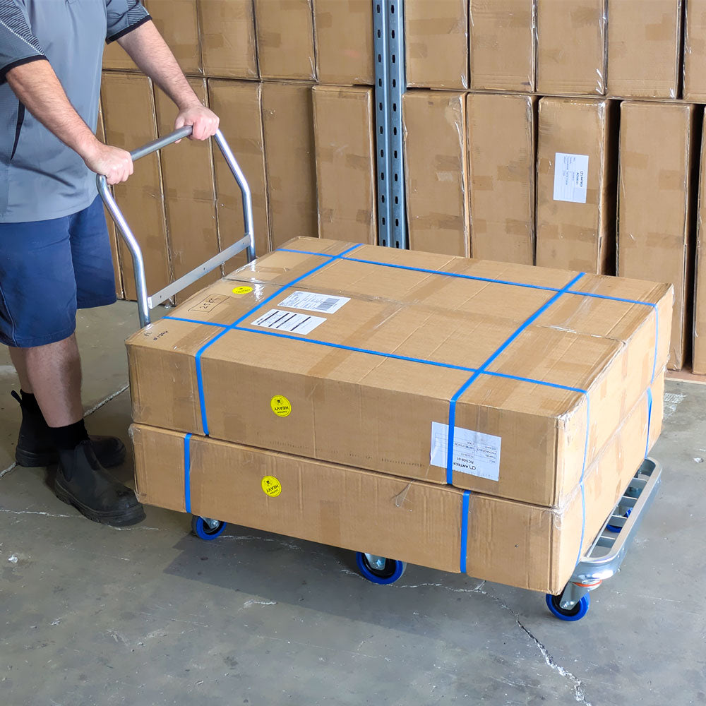 heavy duty warehouse trolley loaded with bulky cartons