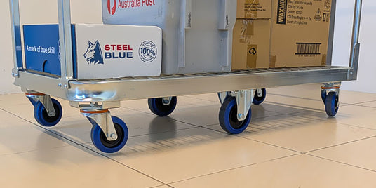 Trolley on tiled floor fitted with quiet rubber wheels