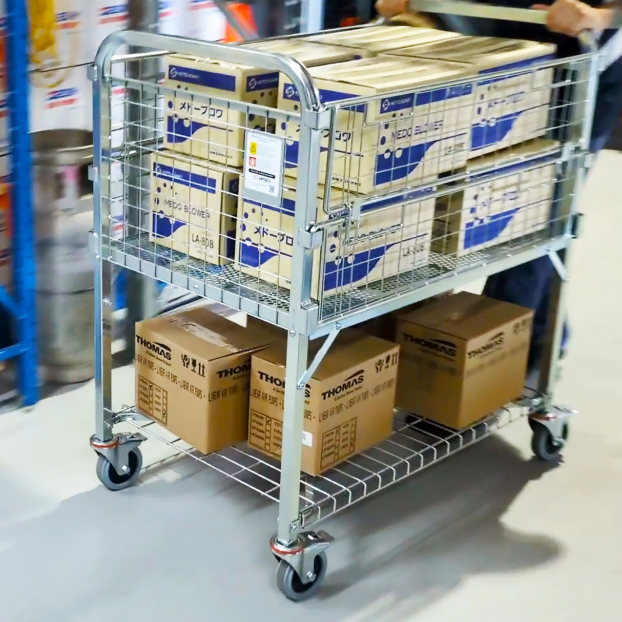 Cart trolley with stacked boxes in a warehouse setting