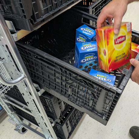order picking trolley tote crate being loaded