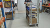 ecommerce order picking warehouse trolley loaded with cartons and trays