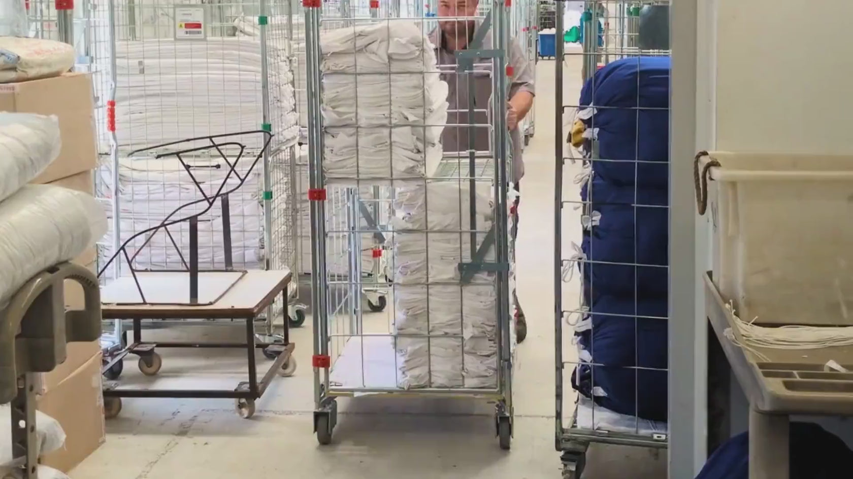 nesting and folding roll cages, parcel and warehouse trolleys for laundries supermarkets convenience stores and postal centres